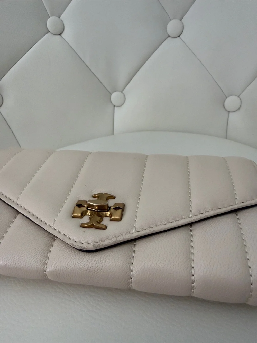 Tory Burch Kira Quilted Envelope Leather  Wallet with turn lock close in Cream